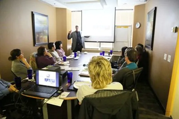 Bryan from Bizbio discussing the DUCA Farms project with his team