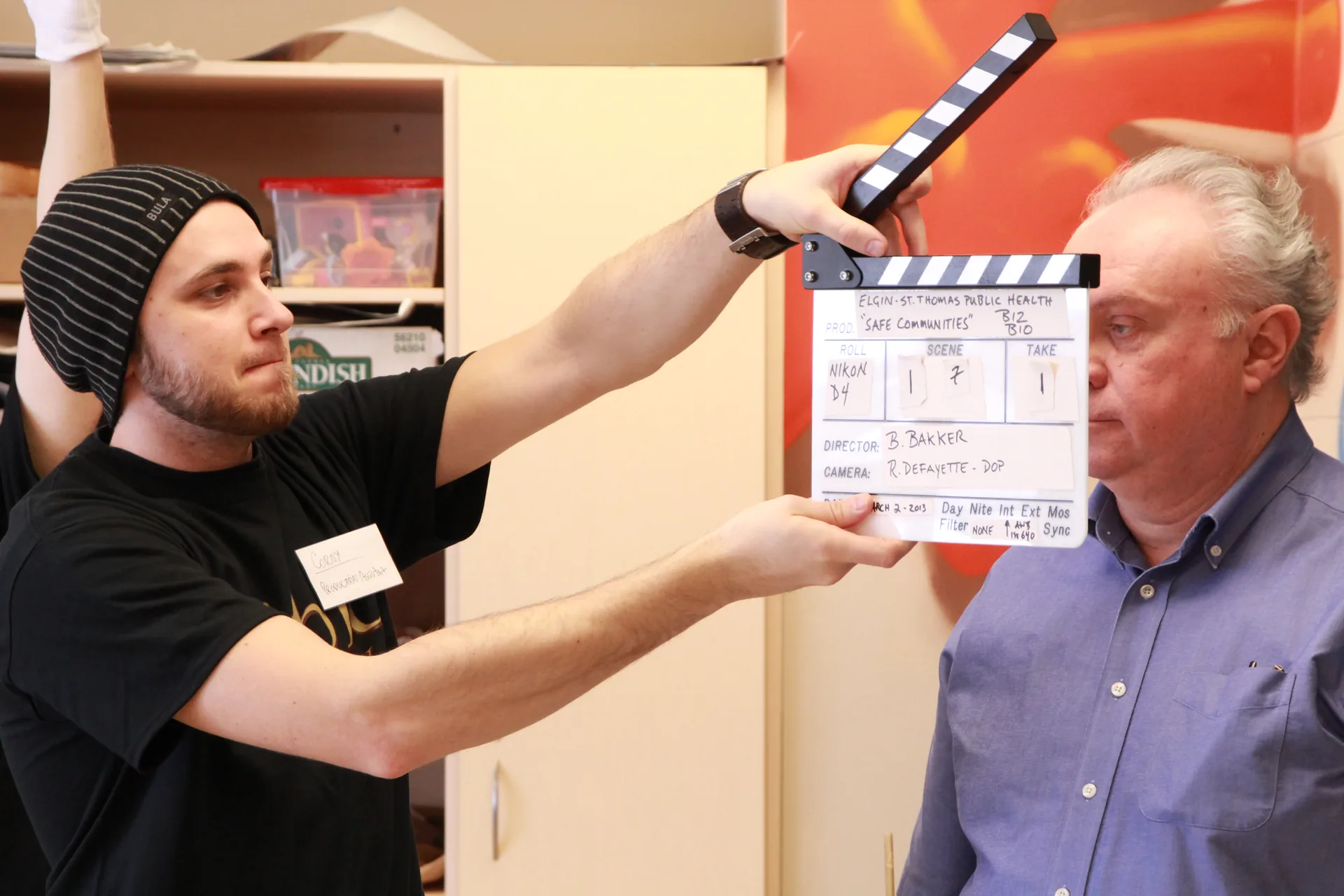 The take. The clapperboard, mid-shoot.