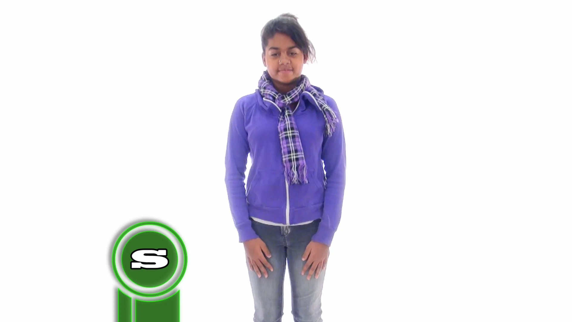 A young person in a purple hoodie and a checkered scarf stands between two green-and-white circular emblems.